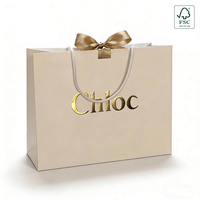 Sac de shopping en papier personnalisé de luxe avec logo, impression dorée élégante, emballage personnalisé pour boutique de détail pour marque de mode