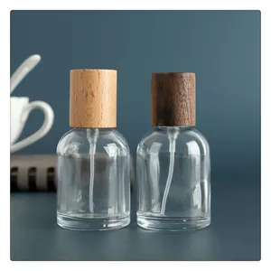 Luxus Design 30ml 50ml 100ml Probe Parfüm flaschen Zum Verkauf Kleines Spray Leere Glas Parfüm flasche Mit Pumpe Und Holz kappe