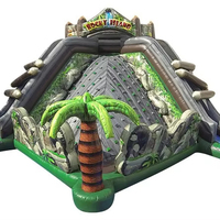 Structure gonflable commerciale à thème Volcan et Jungle avec toboggan, en PVC robuste, pour enfants, idéale pour les jeux de rebond, les événements extérieurs et la location.
