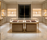 Comptoir de présentation de bijoux en verre acrylique incurvé haut de gamme, cadre or champagne, base en velours, éclairage LED de luxe, vitrine haut de gamme