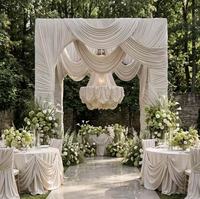 Grande installation artistique en organza et soie en forme de fleur géante pour la décoration de scène de mariage ou de fête