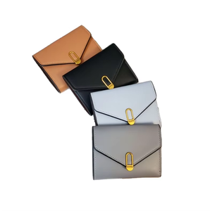 กระเป๋าสตางค์ผู้หญิงปี 2025 หนังนิ่มคุณภาพสูง ดีไซน์เรียบง่ายแบบสามพับ สีดำ มีช่องใส่เหรียญขนาดเล็ก พับได้ ทันสมัย - Product Image 1