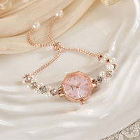 Montre à quartz rétractable élégante de style rétro avec perles, édition haut de gamme, écologique, luxe léger, tendance, minimaliste, en alliage