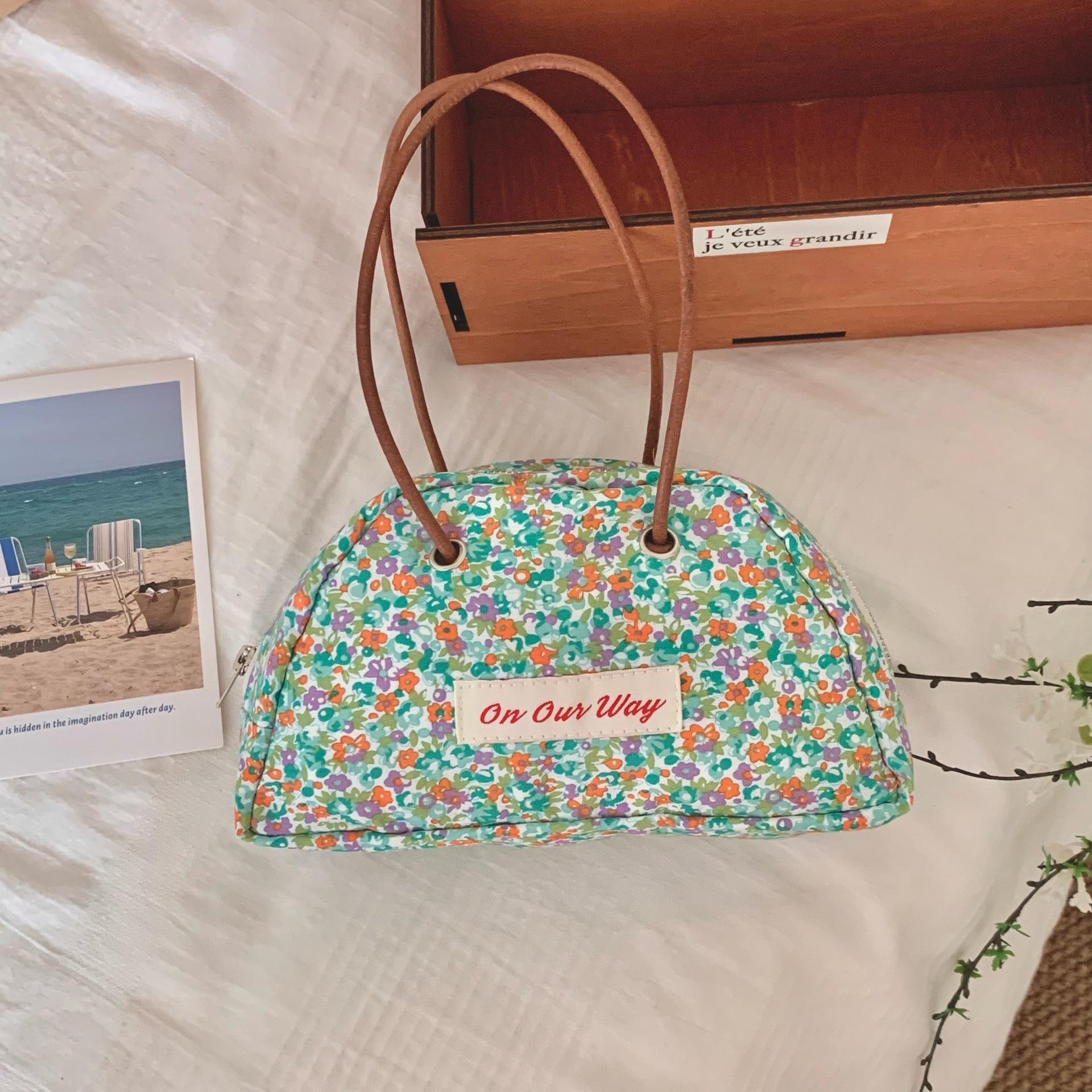 Green floral decal half round bag