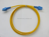 Sampel Gratis Kabel Patch Fiber Optik Indoor 7M 12-Fiber LC/PC Singlemode SM OS2 Berkinerja Tinggi 2.0mm LSZH Bersertifikasi ISO9001 FTTH
