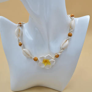 Nouveau design naturel coquille de mer cauri tissé tour de cou mode Hawaii plage Plumeria fleurs perles de bois tressé déclaration collier - Product Image 1
