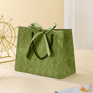 <span class=keywords><strong>Sac</strong></span> cadeau portable vert de luxe léger avec ruban en carton blanc pour <span class=keywords><strong>le</strong></span> rangement de vêtements et de bonbons - Product Image 1