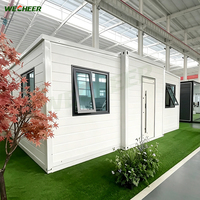 Bâtiment modulaire extensible résistant aux intempéries, maison conteneur extensible, vente en gros, préfabriqué sur mesure 20 pieds pour chambres de camping