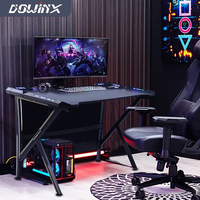Nouveau bureau de jeu électrique en fibre de carbone avec structure stable RVB pied table de joueur de compétition électrique table de jeu et chaise