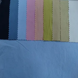 Desain kustom warna Solid berat sedang 100% benang katun kain tenun celup untuk mantel
