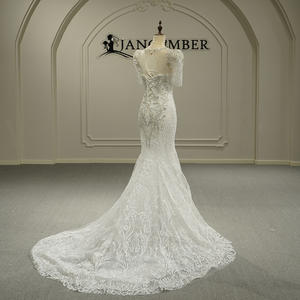 Robe de mariée moderne haut de gamme Gt26047, nouvelle collection, en dentelle artisanale, dos nu, amincissante, ornée de perles, avec traîne chapelle. - Product Image 6