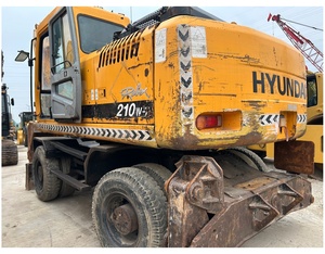 รถขุดไฮดรอลิกแบบล้อ Hyundai 210W-7 มือสอง ขนาด 21 ตัน เครื่องยนต์สีเหลือง ยี่ห้อฮุนได - Product Image 4