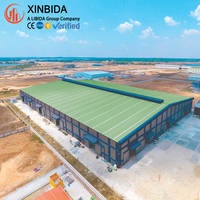 Bâtiment préfabriqué en structure métallique pour complexe d'entrepôts, cadre portique boulonné Q355B avec revêtement Galvalume et marquage CE