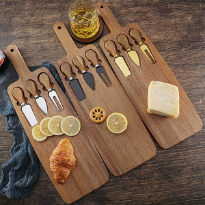 Tabla de Cortar de Madera de Acacia 50x14x2cm con Asa, Bandeja Multifuncional para Servir Queso y Carne, Tabla Rectangular de Madera Maciza para Picnic - Product Image 1