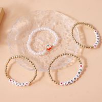 Ensemble de bracelets perlés tendance pour enseignantes, avec breloques en forme de pomme, de crayon et de lettres, bracelet élastique pour femme, cadeau