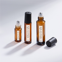 Logo personnalisé ambre clair 5ml 10ml 15ml rouleau de verre vide sur l'huile essentielle bouteille d'huile de parfum avec bille roulante en acier inoxydable