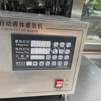 Machine de remplissage semi-automatique à tête unique Henwi avec pompe magnétique, pour liquides en laboratoire, en installation pilote et en petite production
