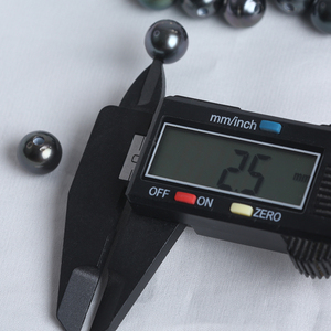 Venta al por mayor de perlas de Tahití sueltas redondas negras de pavo real de agua de mar natural de 11-12mm con agujeros de 2,5mm - Product Image 6