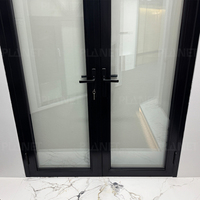 Porte battante moderne à cadre noir en verre trempé double, porte de séparation personnalisée en alliage d'aluminium pour maison, bureau, villa