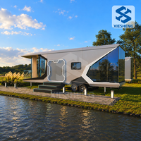 Maison capsule intelligente modulaire préfabriquée de luxe moderne à 2 chambres, 20 pieds 40 pieds, avec cuisine et salle de bain, pour habitation portable