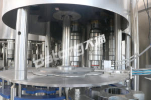 Système flexible de petites bouteilles: vannes de remplissage à changement rapide, étiquetage multilingue, capsulage à <span class=keywords><strong>correction</strong></span> <span class=keywords><strong>automatique</strong></span> - Product Image 5