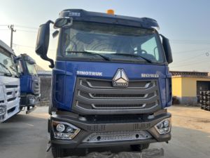 รถบรรทุกหัวลากมือสอง Sinotruk Howo NX 6x4 แบบหลังคาเรียบ พวงมาลัยซ้าย เครื่องยนต์ดีเซลยูโร 2 กำลัง 351-450 แรงม้า รับน้ำหนัก 31-40 ตัน เครื่องยนต์ Weichai สำหรับงานหนัก - Product Image 1