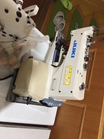 Machine à coudre industrielle à point de chaînette simple fil Jukis MB-1377 d'occasion