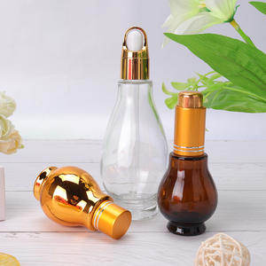 Vente en gros flacon compte-gouttes cosmétique ambré de luxe de 100ml contenants cosmétiques pour soins de la peau et emballage bouteille en verre d'huile marocaine - Product Image 2