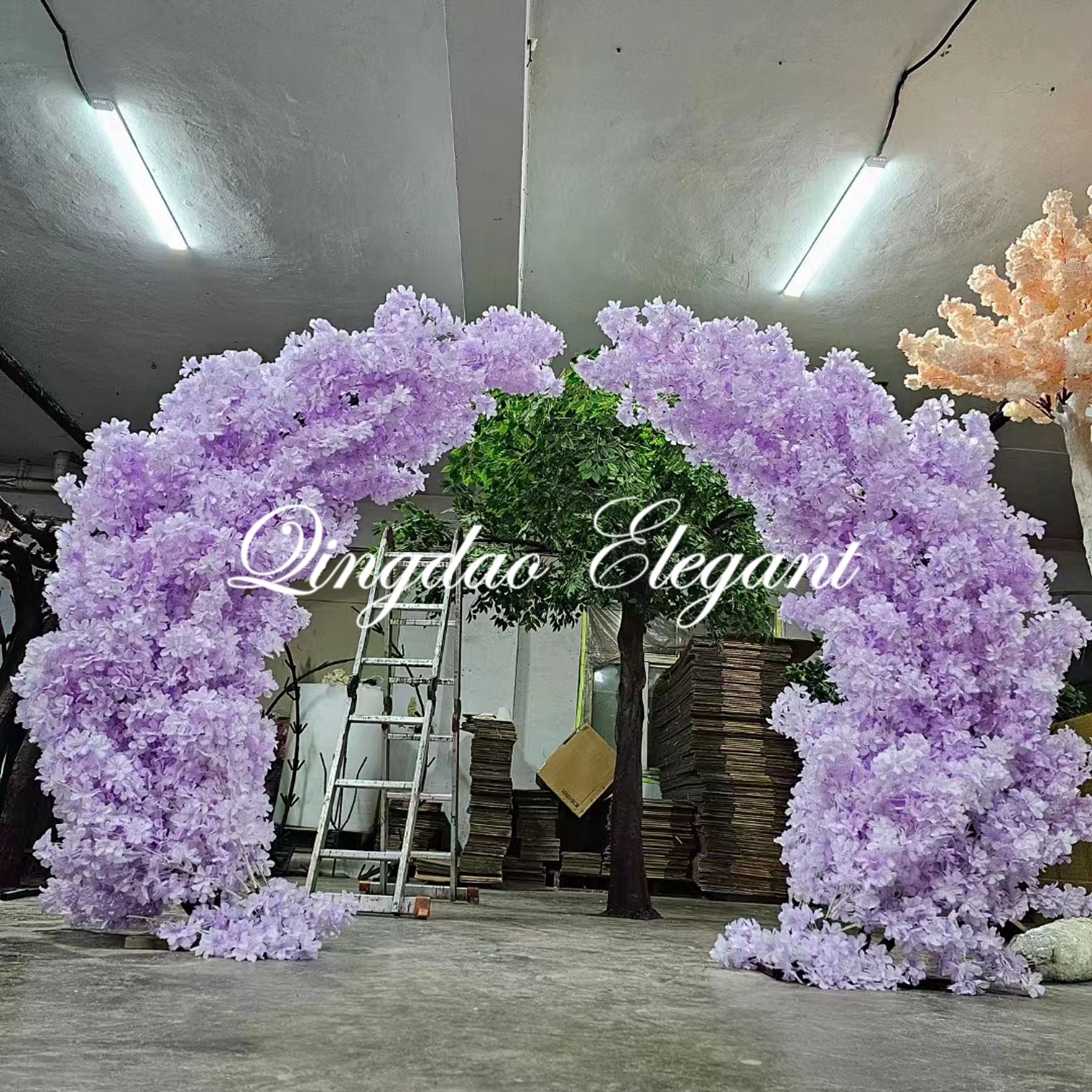 cherry blossom wedding arches decorated with artificial flowers