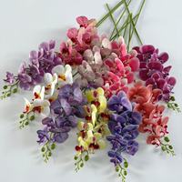 Vente en gros de tiges d'orchidées artificielles en plastique à 9 têtes, effet réaliste, fleurs artificielles pour les décorations florales de mariage, d'hôtel et de table