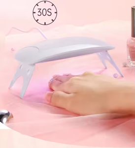 Lámpara de <span class=keywords><strong>Uñas</strong></span> UV de 6 Leds <span class=keywords><strong>Mini</strong></span> al por Mayor, Luz de Curado Portátil para Esmalte de <span class=keywords><strong>Uñas</strong></span> en Gel, Lámpara de <span class=keywords><strong>Uñas</strong></span> UV/LED Sun <span class=keywords><strong>Mini</strong></span> - Product Image 4