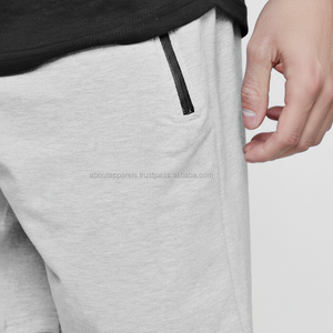 Pantalones cortos transpirables de playa con estampado de hojas para hombre a precio barato, compra a granel de fabricante de ropa de China - Product Image 1