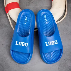 Venta al por mayor nuevo baño suave antideslizante playa hombres estampado diapositivas azul blanco sandalias Eva logotipo personalizado zapatillas Unisex 2023