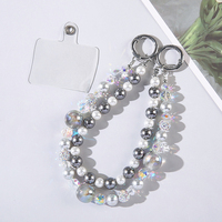Dragonne de luxe portable et durable en alliage de zinc et plastique, ornée de perles de cristal, avec double chaîne, pour téléphone portable, porte-clés, étui de sac et dragonne de poignet
