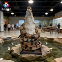 Modèle de serpent animatronique enveloppant un crocodile - Accessoire interactif réaliste pour les expositions de parcs d'aventure et de parcs à thème