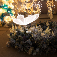¡Venta al por mayor! Alas de mariposa brillantes, soporte de luz LED de plomo para carretera, escenario de fondo para diseño de escena de boda, lámparas
