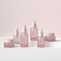Nouveau design, ensemble d'emballages de soins de la peau de luxe rose, bouteille et pot en verre vides à pompe à lotion, bouteille de crème cosmétique avec pompe en plastique