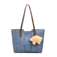 Sac cabas pour femme personnalisable en cuir PU avec logo sur mesure, style tendance, fermeture éclair étanche, bandoulière chaîne, doublure en polyester