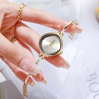 Montre bracelet en alliage à motif diamant, minimaliste, à fines lanières, tendance, écologique, style Instagram, élégante, à quartz, vente chaude