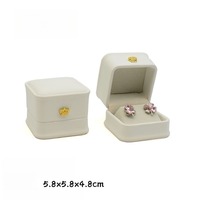 Boîte d'emballage de luxe en cuir PU avec logo personnalisé pour bijoux et boucles d'oreilles