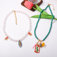 Mode bulk OEM ODM dubbelstrengige kralen choker ketting dames turquoise zaadkraal parel emaille bloem fruit charme kettingen