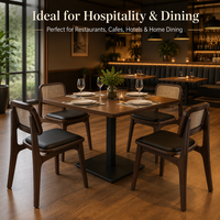 Chaise de restaurant en bois commerciale avec dossier en rotin tressé et assise rembourrée noire, cadre courbé, pieds effilés