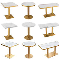 Table à manger carrée en marbre doré de luxe pour hôtel et restaurant moderne avec base en acier inoxydable