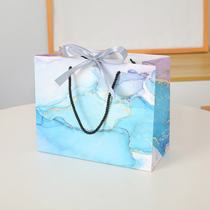 Sacs cadeaux en papier blanc de luxe écologiques en gros avec poignées en ruban personnalisables pour chaussures et vêtements - Product Image 5