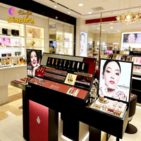 Meubles de présentation cosmétique de luxe en acier inoxydable écologique avec éclairage LED, options personnalisables pour le commerce de détail en centre commercial