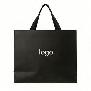 Low MOQ Luxury Black White Brown Kraft <b>Paper</b> Gift Bags with Ribbon Handle Custom Logo Printed Luxury Cardboard Jewelry Packaging - Product Image 1