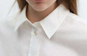 เสื้อเชิ้ตผ้าฝ้ายสีขาวเรียบง่ายสำหรับผู้หญิง แขนยาว ติดกระดุม มีกระเป๋า ปกคอเสื้อพับได้ สไตล์ลำลอง - Product Image 4