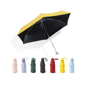 Hot Selling Wholesale Sun Uv Umbrella High Quality Small Capsule Mini Pocket Women Umbrella 5 Folding Umbrella Manual Portable