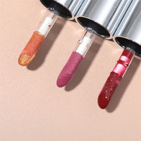 Vente en gros de gloss à lèvres repulpant personnalisé, mignon, aromatisé, hydratant, en tubes argentés sans logo