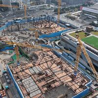 Grue à tour à plateforme plate Dahan 250t.m 7025 12 tonnes, hauteur de levage maximale 200 m, haute efficacité pour les projets de construction